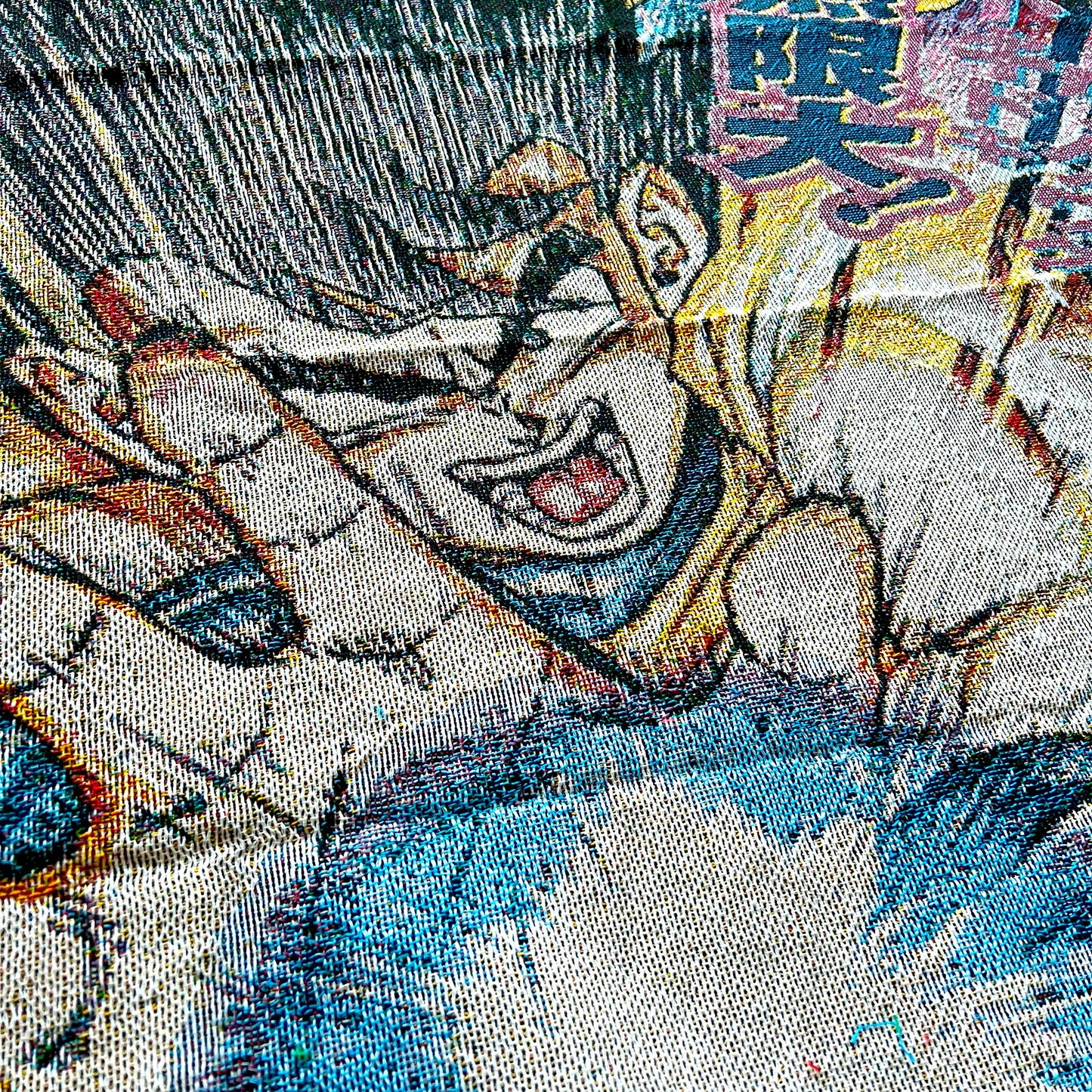 Close-up side view of a Dragon Ball Z blanket emphasizing vivid artwork and cozy, soft material.