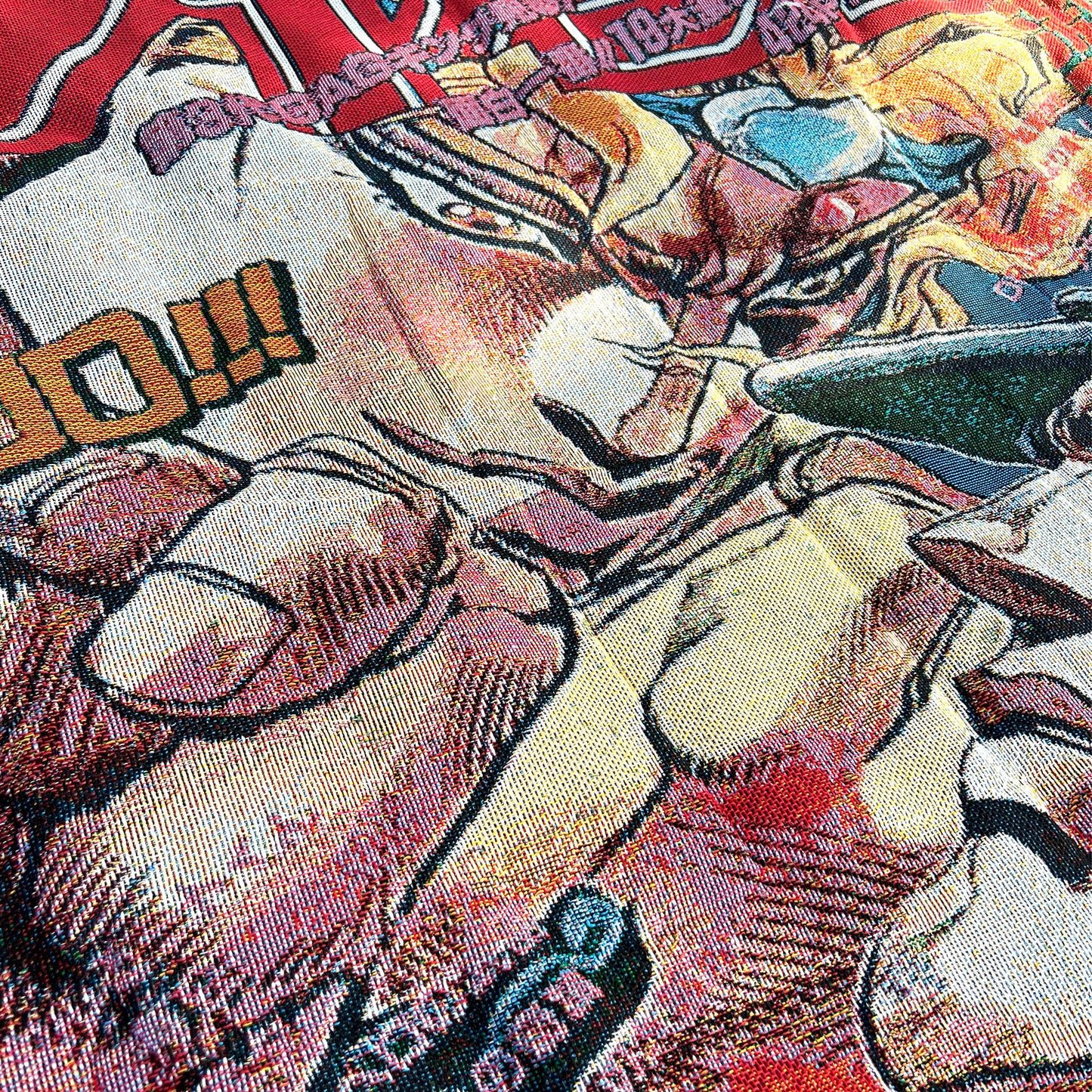 Close-up side view of a JoJo’s Bizarre Adventure tapestry highlighting the dramatic poses and vivid colors of Jotaro and Dio.