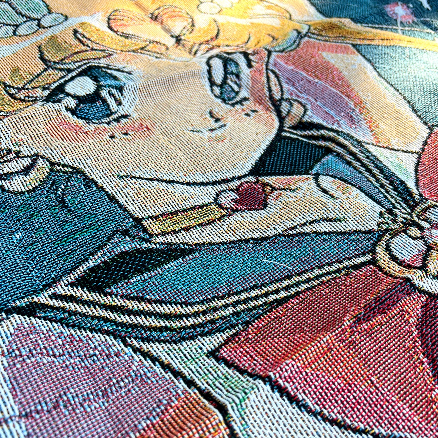 Close-up side view of a Sailor Moon tapestry emphasizing its intricate design and rich, vibrant tones inspired by the beloved anime.