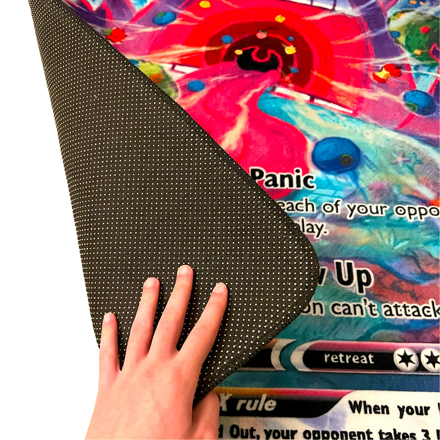 Close-up of a Gengar VMAX rug with a hand lifting the corner, highlighting the smooth texture and premium craftsmanship.