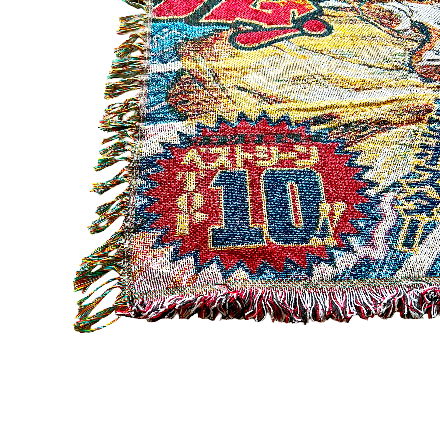 Close-up of a Dragon Ball Z blanket with a hand lifting the corner, highlighting the plush texture and premium craftsmanship.