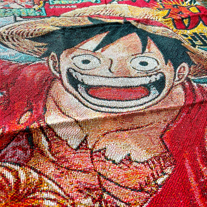 Close-up side view of a One Piece tapestry emphasizing vivid artwork and high-quality fabric details.